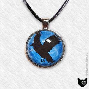 25mm black raven flying on blue sky - art pendant set with glass cabochon
