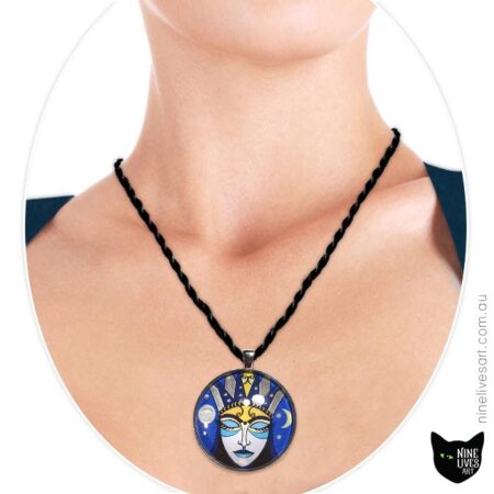 40mm moon goddess pendant with silver enamel in 40mm glass cabochon worn by model
