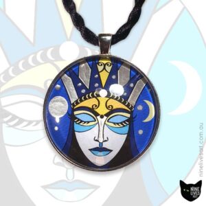 Art pendant featuring inward reflecting moon goddess on deep blue background 40mm diameter