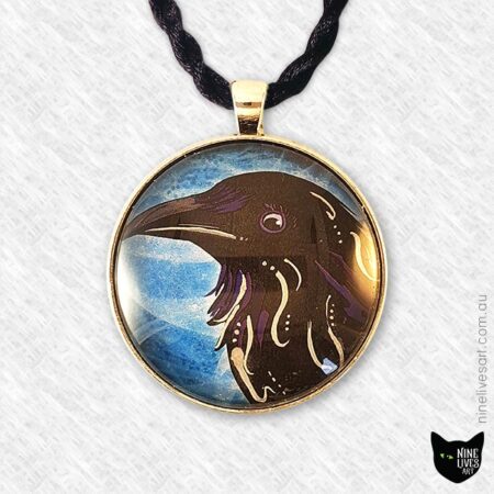 Black raven head on blue sky 40mm cabochon art pendant