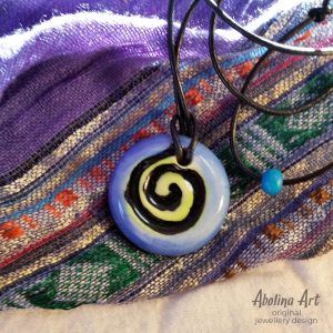 Small Spiral pendant blue citrus and black strung on leather cord