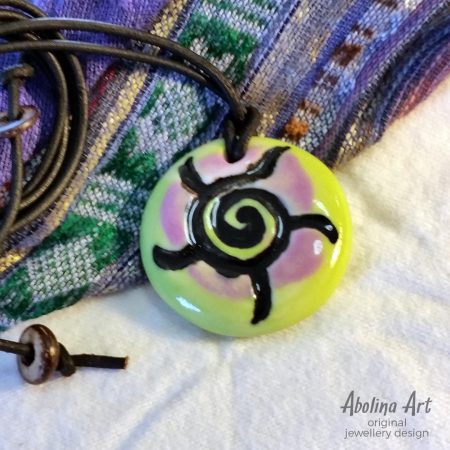 Sun Spiral pendant stoneware clay in lime iris colours