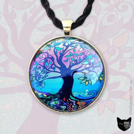 Psychedelic Dawn 40mm pendant on backdrop featuring enlarged tree artwork