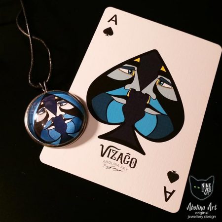 Ace of Spades 25mm pendant displayed with VIZAGO playing card