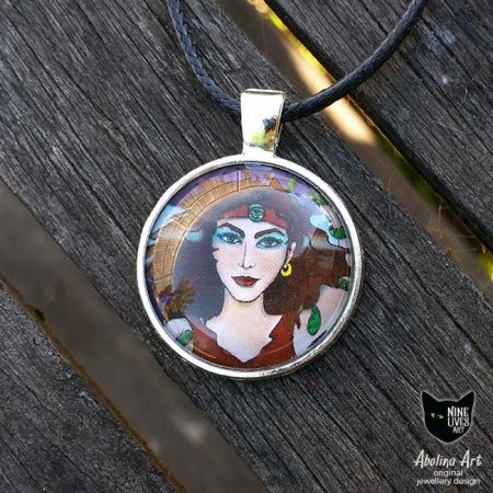 Original pendant featuring the Magician, strong female archetype