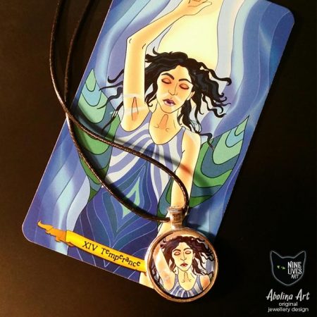 Temperance art pendant and tarot card displayed together