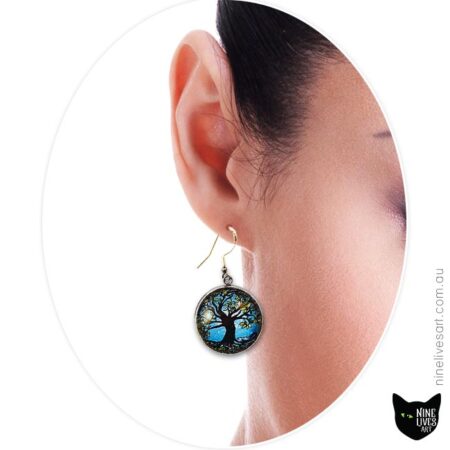 Model wearing 25mm Tree of Life earrings