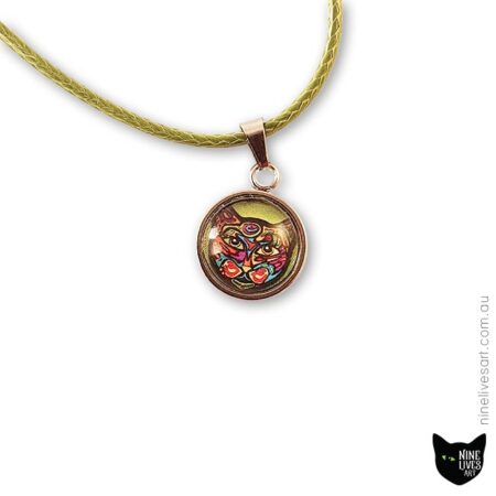 Colourful cat on green background in 12mm cabochon setting