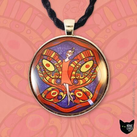 40mm pendant featuring red fairy flying on indigo sky