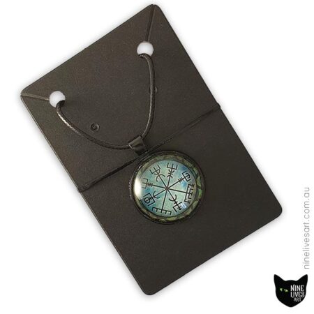 Small green vegvisir pendant secured on jewellery card