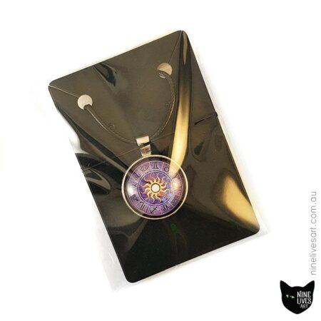 25mm purple zodiac sun pendant in clear bag on black jewellery card