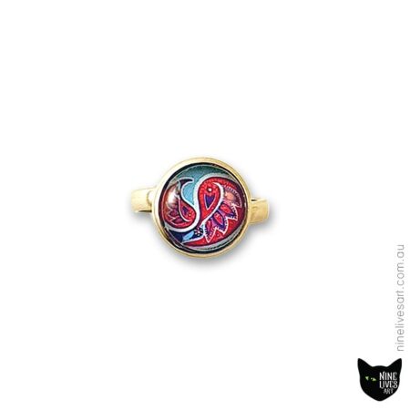 Flamingo and blue hues featured on 12mm cabochon ring