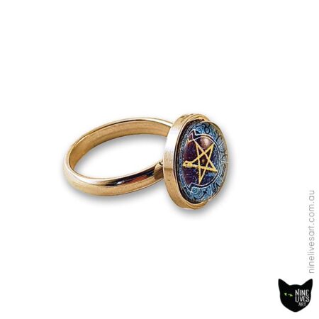 side view of cabochon ring with zodiac design