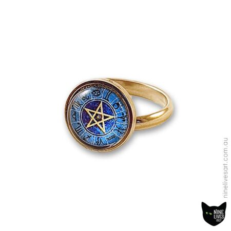 Front-side view of cabochon ring with zodiac design