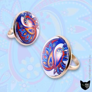 25mm cabochon rings featuring paisley artwork and hypoallergenic ring base fitting