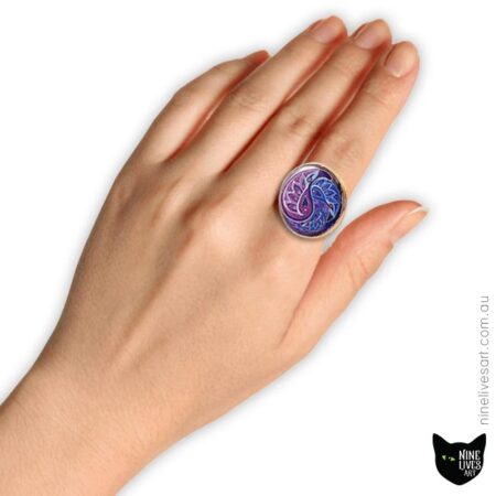 Model wearing 25mm resin ring featuring paisley artwork in purple