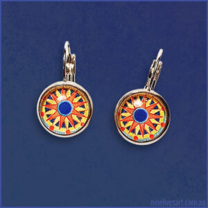 Sun Mandala 12mm earrings on blue background