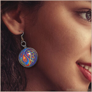Model wearing 25mm paisley earring