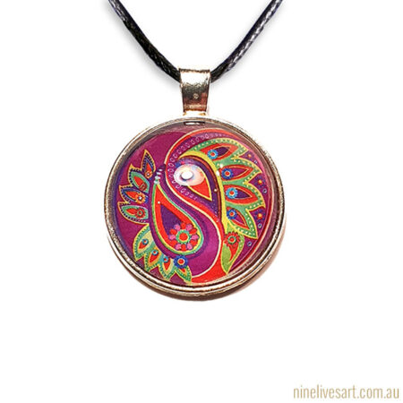Paisley pendant in green and magenta lime colours strung on cord
