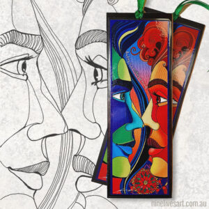 Bookmark featuring two brightly painted faces in profile.
