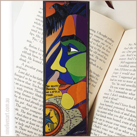 Hero's Journey bookmark by Abolina Art placed on open book