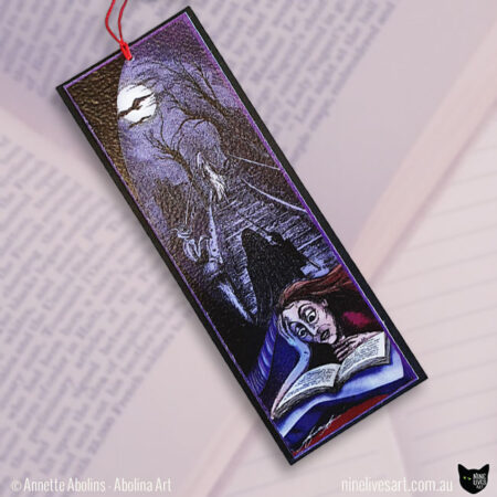Art bookmark depicting woman reading late at night with haunted scene in background