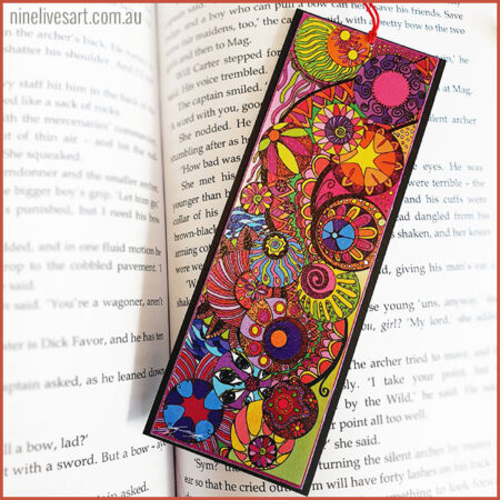 Colourful art bookmark featuring line drawing of circles painted in bright colours