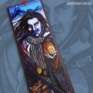 Art bookmark featuring wind-swept hero returning from quest with mountains in the background