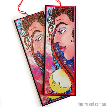 Art bookmark featuring woman in profile with sun and moon